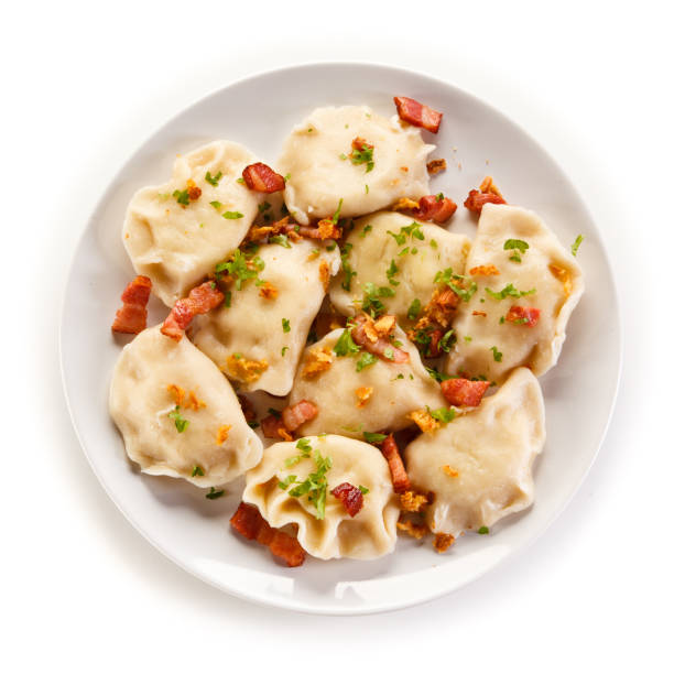 Dumplings - stuffed noodles Dumplings - stuffed noodles on white background pierogi stock pictures, royalty-free photos & images