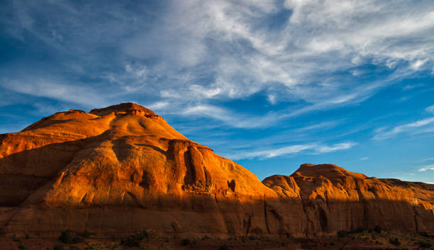 istock Red sandstone cliff in Monument Valley 1029372644