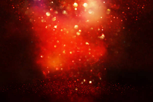 istock Red, black and gold glitter vintage lights background. defocused. 1029391274