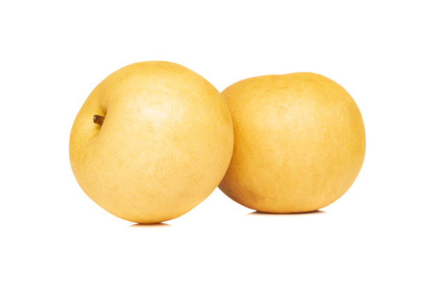 istock Chinese golden pears on white background 1029391974