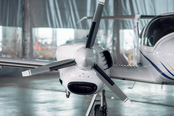 istock Propeller airplane in hangar, plane on inspection 1029392068