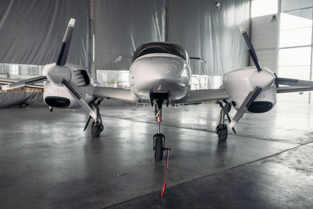 Private turbo-propeller airplane in hangar, nobody
