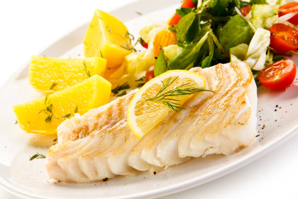 istock Grilled cod fillet with fried potatoes and vegetables 1029396656