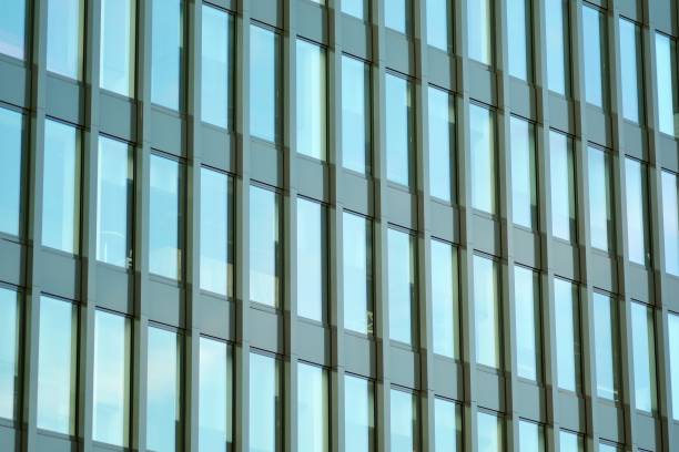 istock Glass curtain wall of modern office building 1029424544