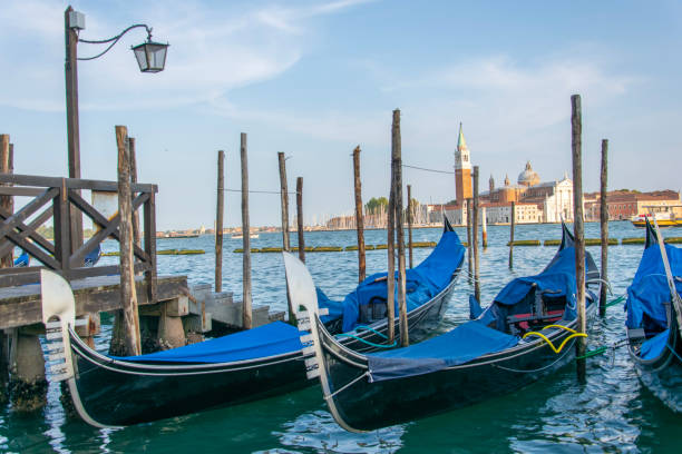 istock Docked gondolas in Venice Italy 1029424994