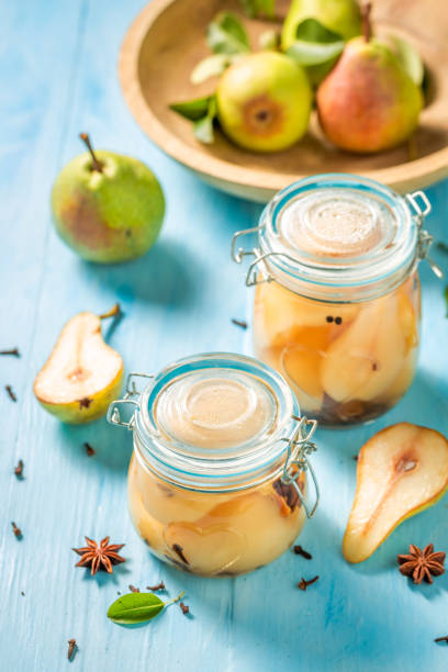 istock Ingredients for fresh pickled pears on blue table 1029425298