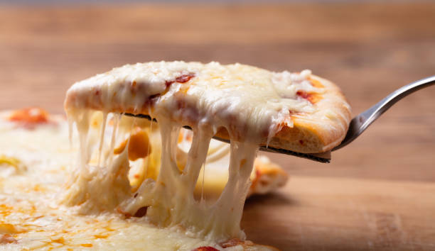 close-up of a delicious pizza - stringy imagens e fotografias de stock