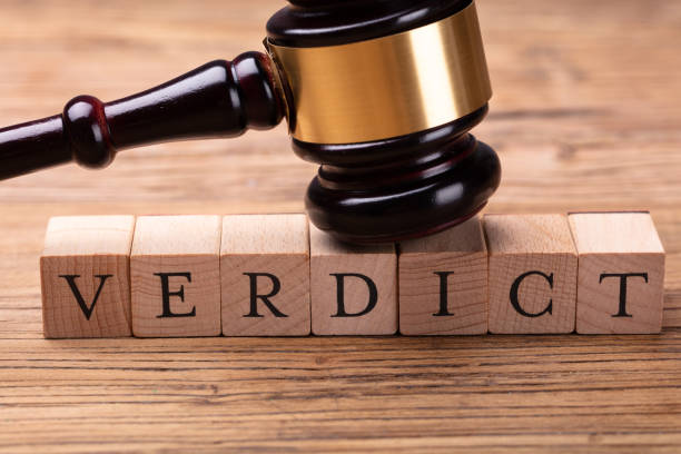 istock Gavel Over Wooden Blocks With Text Verdict 1029427664