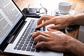 istock Close-up Of A Person Typing On Laptop 1029427710