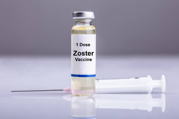 istock Zoster Vaccine Bottle With Syringe 1029428040