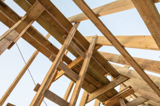 istock Wooden rafters against the blue sky at sunset 1029452090