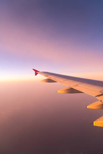 istock Clouds and sky sunny day through airplane window 1029464058