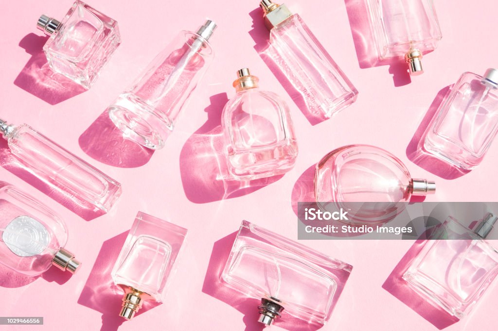 Perfume bottles Perfume bottles on pink background Perfume Stock Photo
