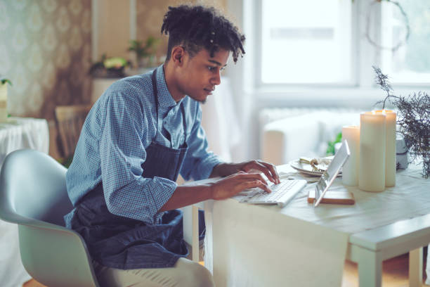 istock Hipster entrepreneur is communicating with his clients online 1029466852