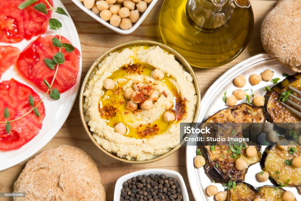 Hummus meal Hummus meal with spices and vegetables Food Stock Photo