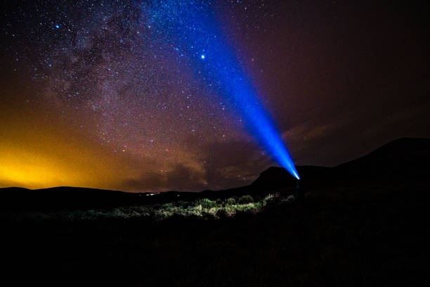 istock Light Beams and Milky Way Galaxy Landscape Scenic 1029474770