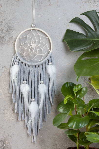 istock Gray beige dream catcher on gray 1029479300