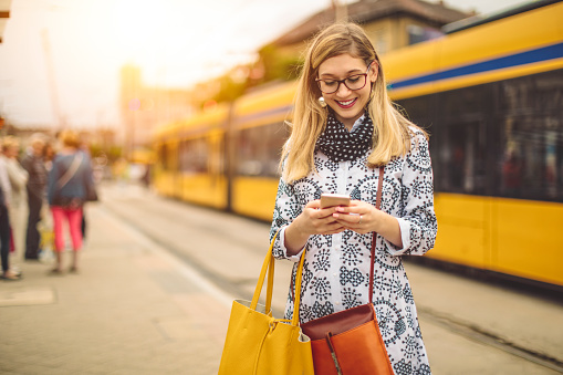 Young woman is checking her messages