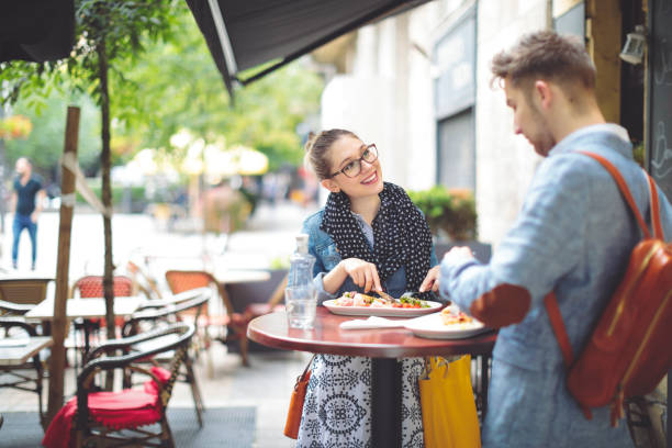istock Friends are having lunch in a sidewalk cafe 1029482098