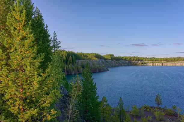 istock Summer landscape mountain lake blue sky and clouds 1029493586