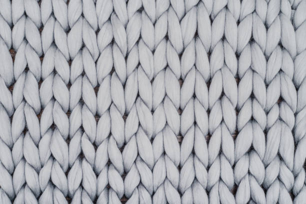 istock Gray knitted blanket from merino wool 1029496928