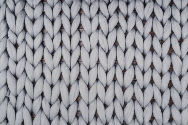 istock Gray knitted blanket from merino wool 1029496946