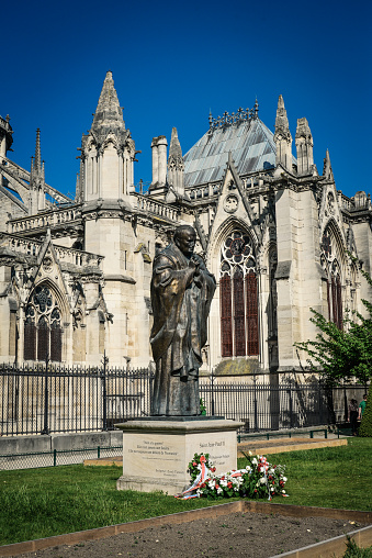 Paris, France - May 6, 2018: Bronze statue of John Paul II. made by Zurab Tsereteli near the cathedral Notre-Dame de Paris.