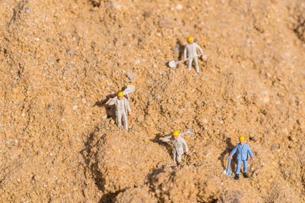 istock High Angle View Of Figurines Working At Construction Site 1029518880