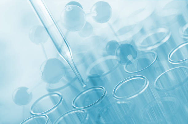 istock Digital Composite Image Of Chemical Experiment Over Atoms 1029523932