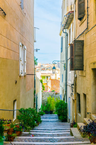 A narrow street in the Le Panier district of Marseille, France A narrow street in the Le Panier district of Marseille, France marseille panier stock pictures, royalty-free photos & images