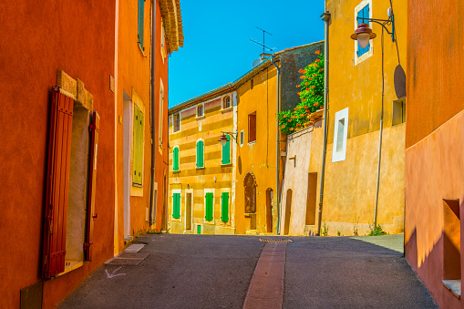 A narrow street in Roussillon village in France