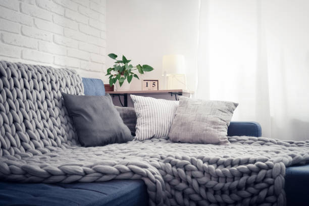 Gray knitted blanket from merino wool