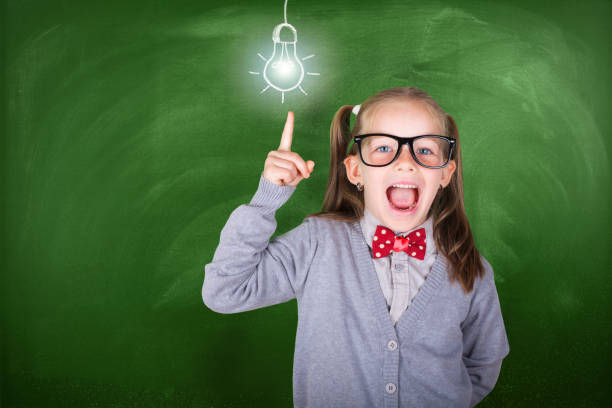 istock Little teacher showing school education concept 1029534518