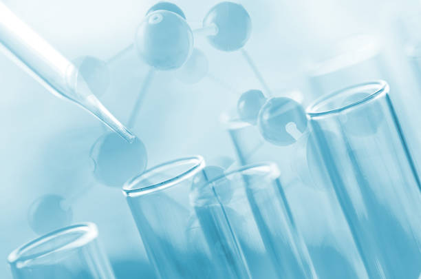 istock Digital Composite Image Of Chemical Experiment Over Atoms 1029534582