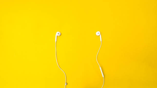 istock earphone on yellow background business concept desk table 1029541770
