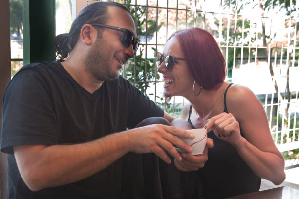 istock Romantic couple drinking coffee ,having a date in the cafe. 1029549300