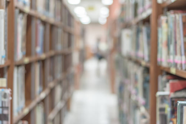 istock Blur school library or study room with book shelves for education background 1029549622