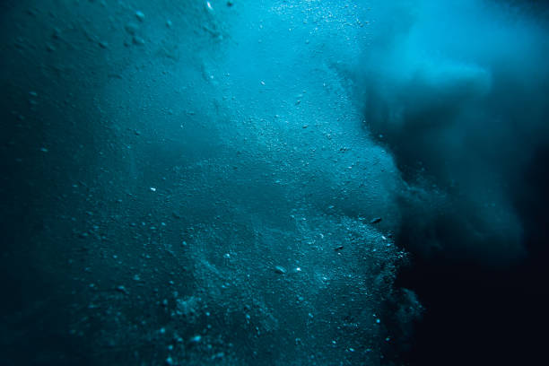 istock Wave underwater with air bubbles. Blue sea in underwater 1029570790