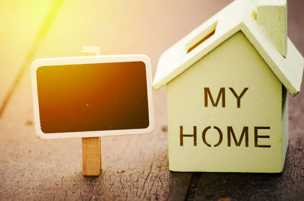 istock small wooden house and signage for text 1029594440