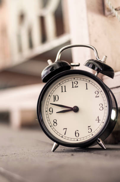 istock vintage alarm clock for time management concept 1029594492