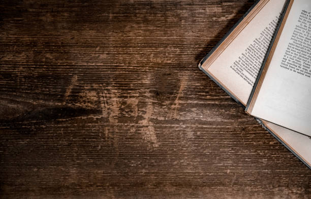istock Books and rustic wood background - Overhead 1029606614