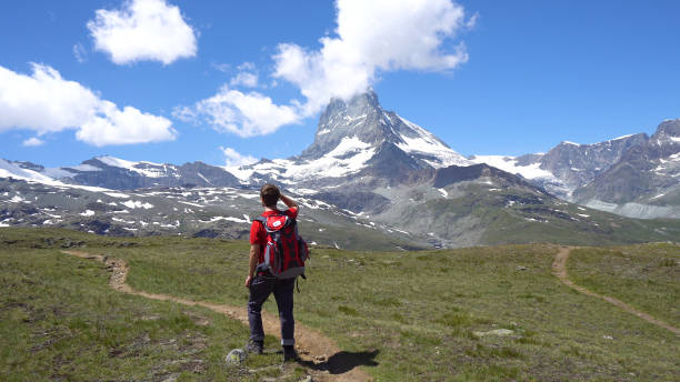 istock Young Hiker in Alpine Mountains 1029614012