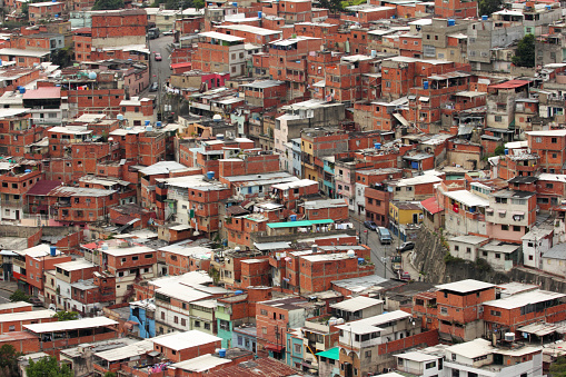 Simple houses or ranchos in Caracas, Venezuela. Ranchos are the forms of informal poor housing that cover the hills surrounding the city. Clusters of self-built ranchos form larger neighbourhoods