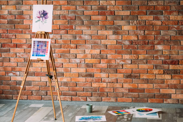istock artist workspace painting workshop loft brick wall 1029627496