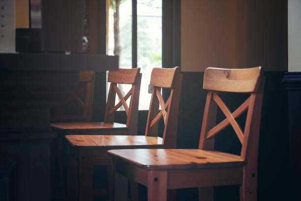 istock Empty Wooden brown chairs on the balcony in cafeteria. 1029637616
