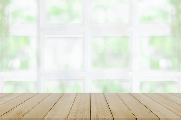 istock Empty wooden table and window room interior decoration background, product montage display,can be used for display or montage your products.Mock up for display of product. 1029637876