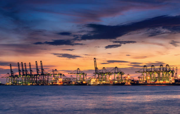 istock Shipping terminal and loading port at sunset scene 1029645332