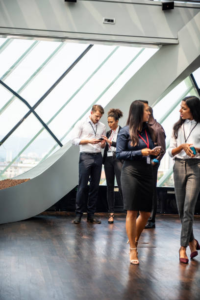 istock Business People Walking Through the Corridor 1029650262