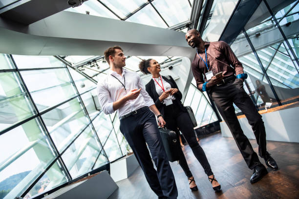 istock Business People Walking Through the Corridor 1029650266