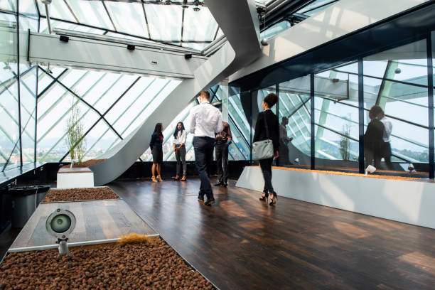 istock Business People Walking Through the Corridor 1029650270